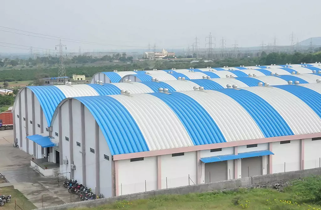 Large Warehouse with Blue and White Roofing Panels